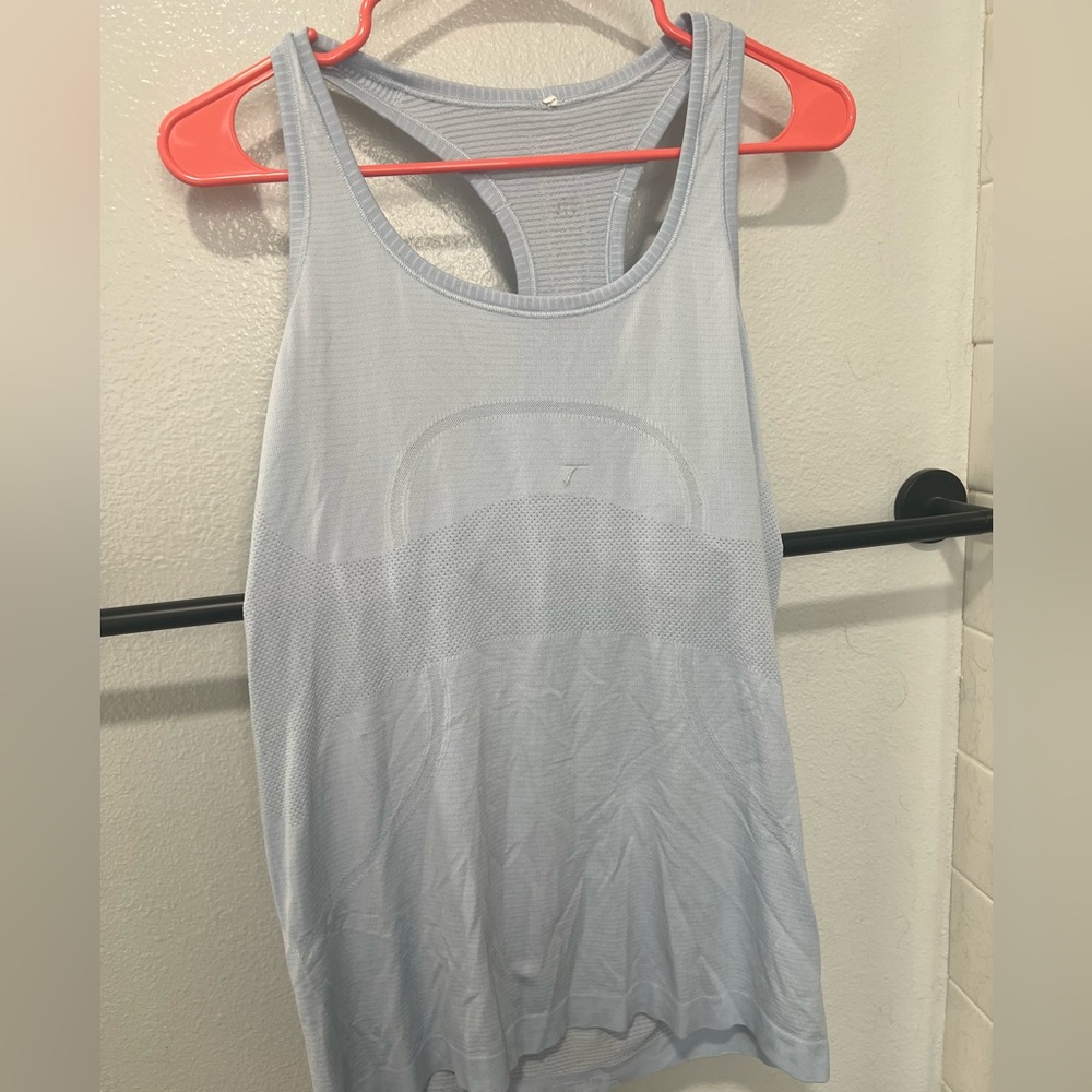 Lululemon baby blue size 10 tank top good condition but one snag on front